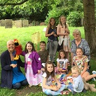 Children and leaders in Ashover Churchyard with Prayer Tree